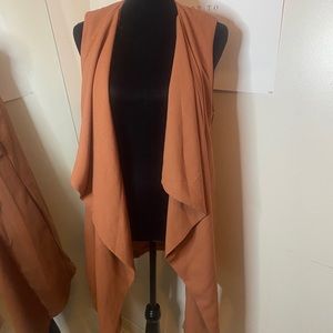 Orange sleeveless vest